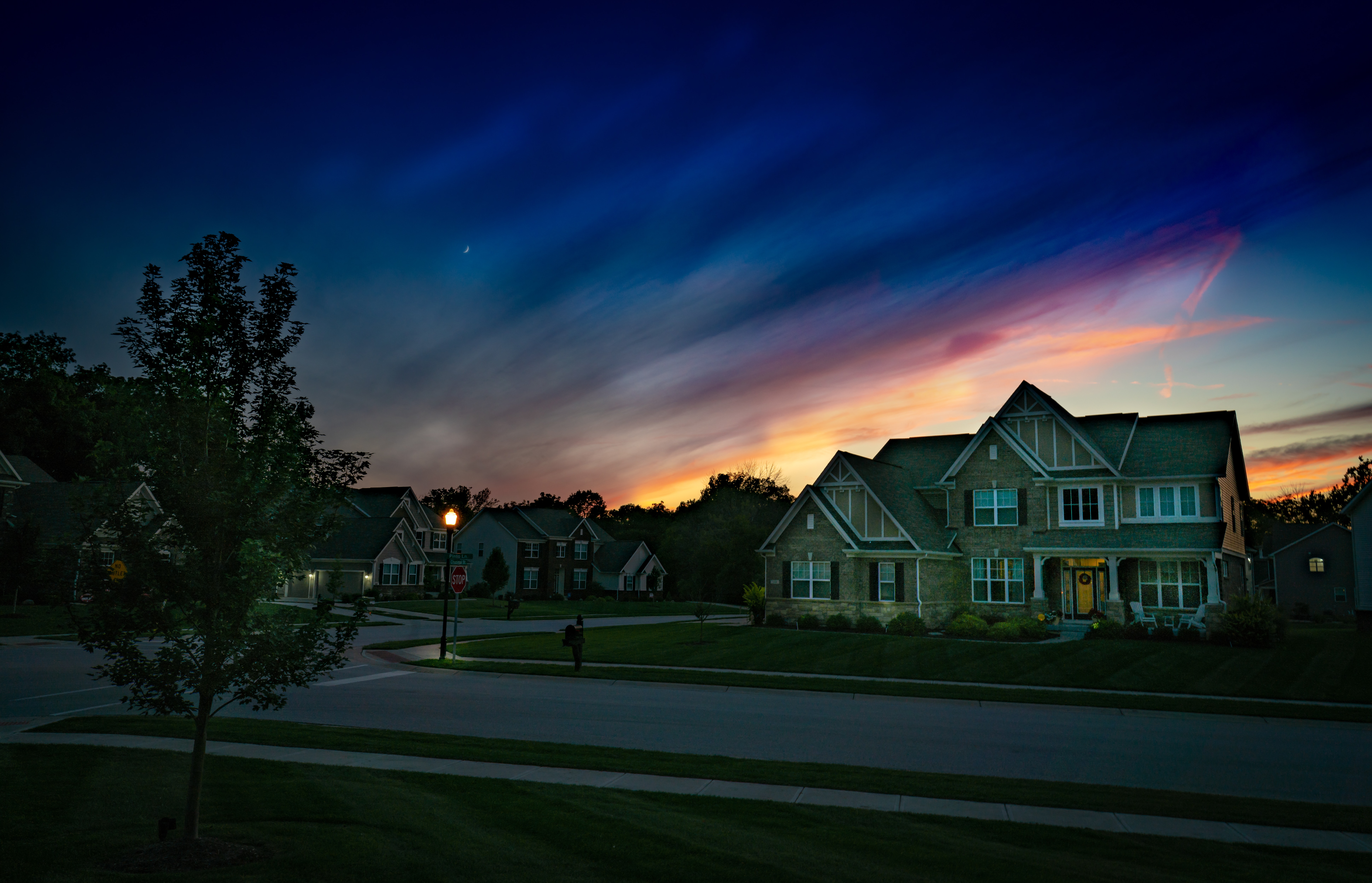 Sunset over beautiful well kept home in Halifax Nova Scotia. It is flawless. Clean washed windows, clean gutters, laundry vents and clean chimney.